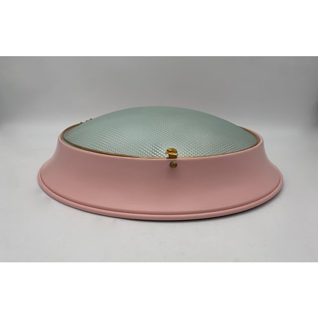 Lamps attributed to Fontana Arte. Sold as a pair. Ceiling or wall lamp, featuring a simple and functional design typical...
