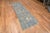 An Artistic and Decorative Light Blue Abrash Background and Tribal Geometric Ivory White Pattern Modern Hallway Runner...
