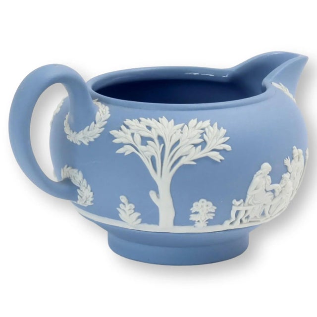 Wedgwood jasperware creamer with date stamp on bottom for 1969. Maker's mark on underside.