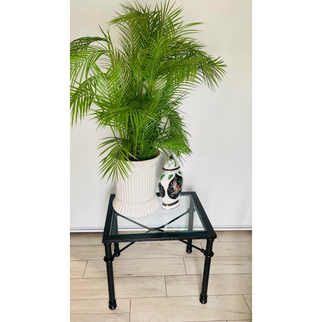 Giacometti brutalist style end table in a black finish with a thick glass top. Indoor or outdoor it’s a fabulous table, we...