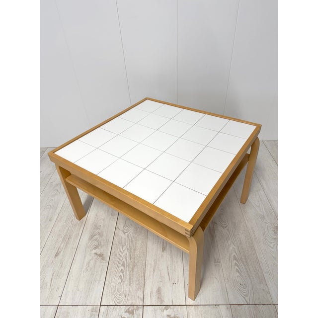 Coffee table designed by Aino Aalto Artek production 2002, manufacturer's label under the base Minor signs of wear This...