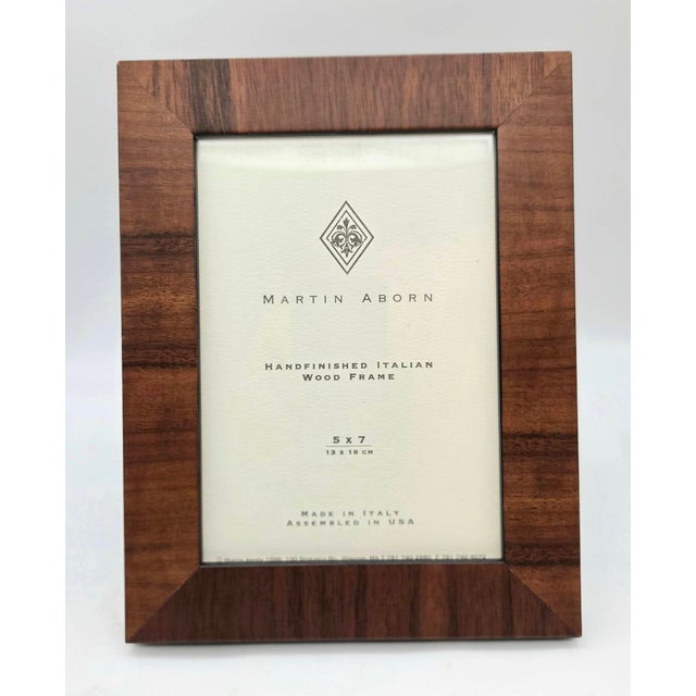 Offered is a Martin Aborn brand 5" x 7" picture or photo frame that has a composite wood border that resembles Rosewood...