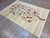 Bring home a piece of history and art with this Handmade Vintage Persian Style Gabbeh Rug. This stunning rug from the...