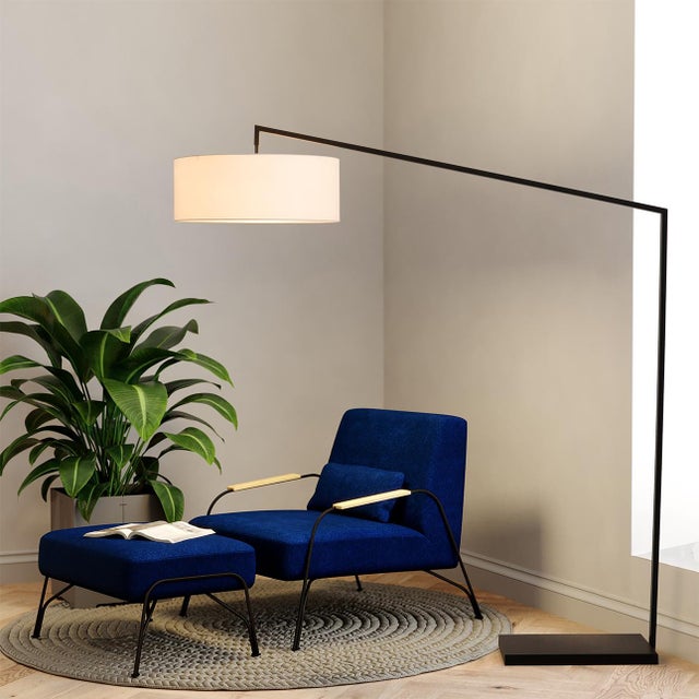 Practical modernity meets bold sophistication with the Stretch Chairside Arc Floor Lamp, now available in a captivating...