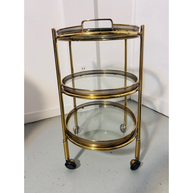 This elegant bar cart was produced by Maison Jansen, Paris, one of the most influential French decorating houses of the...