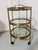 This elegant bar cart was produced by Maison Jansen, Paris, one of the most influential French decorating houses of the...