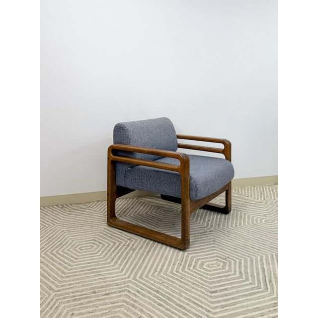 This clean and comfortable vintage mid-century modern accent chair is a solid and versatile seating find. The rounded wood...