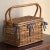 A beautiful late 20th century French Country-style split bamboo picnic basket. This petite basket features a blue and...