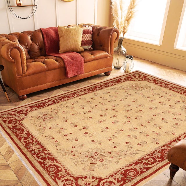 "Enhance the ambiance of your home with this magnificent Persian-influenced Turkish hand-knotted rug made by skilled...