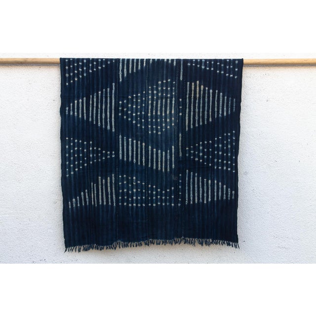 Hand-woven by master weavers of the Mossi and Dioula traditions in Burkina Faso, West Africa, these vintage textiles are...