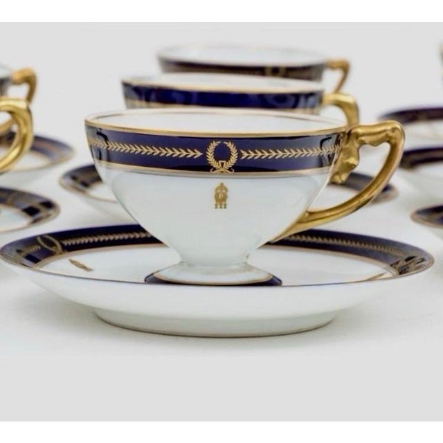A rare and complete 24-piece demitasse set by Rosenthal, featuring full set of 12 richly decorated cups and 12 matching...
