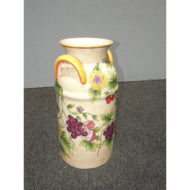 Unique Milk Can/ Umbrella Stand in Great Vintage Condition. Solid and Firm. Wear is usual for its age. Please see the...