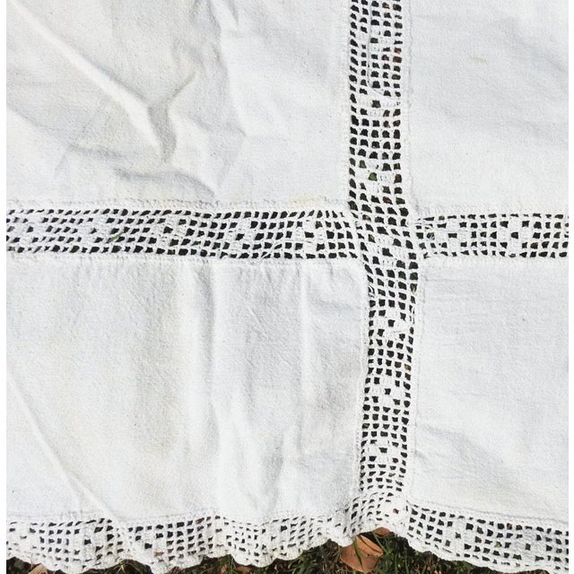 Vintage circa 1930's rustic handmade tablecloth or bedspread. Cotton feed sacks connected with bands of filet crochet....
