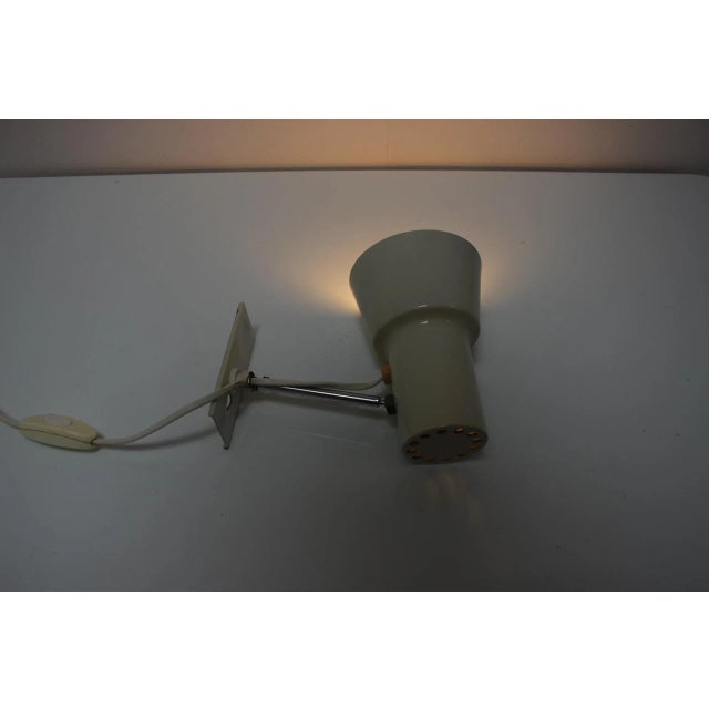 Simple wall lamp designed by Josef Hurka, manufactured by Napako, in the 1960's, in Czechoslovakia. Made of metal and...