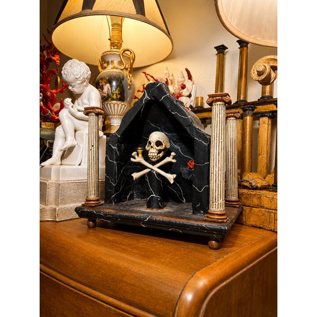 An unusual Memento Mori shrine executed in the Neoclassical manner, combining Classical architectural elements with the...
