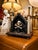 An unusual Memento Mori shrine executed in the Neoclassical manner, combining Classical architectural elements with the...