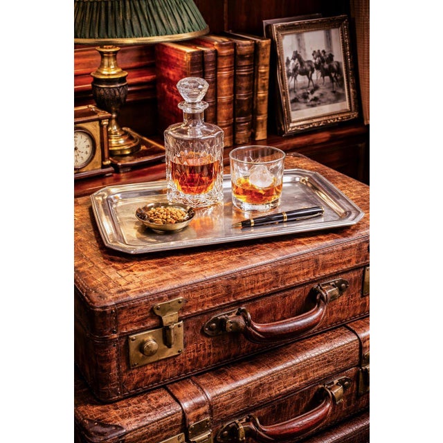 A sleek and sophisticated vintage silverplate tray, this striking piece embodies the clean geometry and refined elegance...