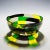 A Pezzato Americano bowl in yellow, green, straw and black colored glass designed by Fulvio Bianconi in 1950. Manufactured...