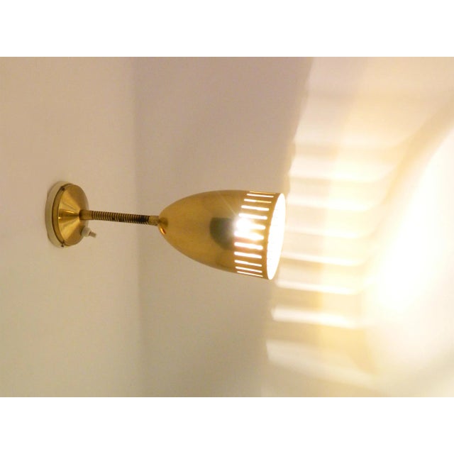 This pair of wall lamps was produced by the company Nikoll Wien in the 50s. Consisting of a wall bracket with on/off...
