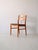 Original vintage chairs with padded seat. The wooden structure has a backrest formed by two slightly curved horizontal...