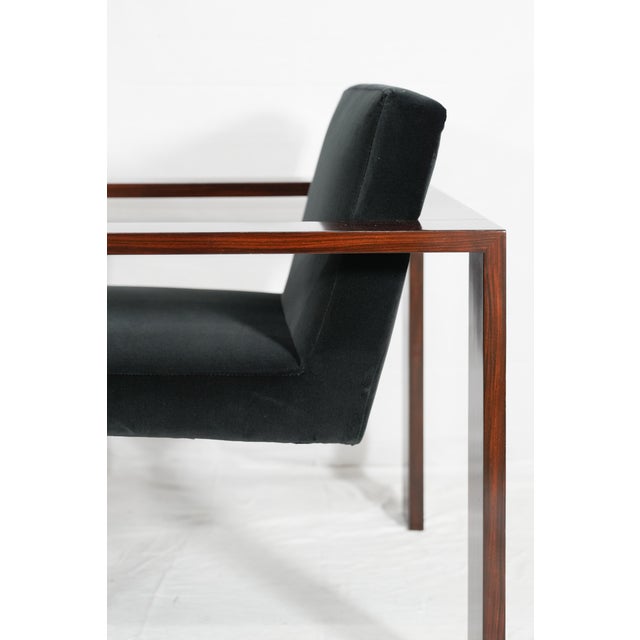 Sculpted elegance crafted from rich quartered rosewood. Open frame with a hand-upholstered design. Astute blend of classic...