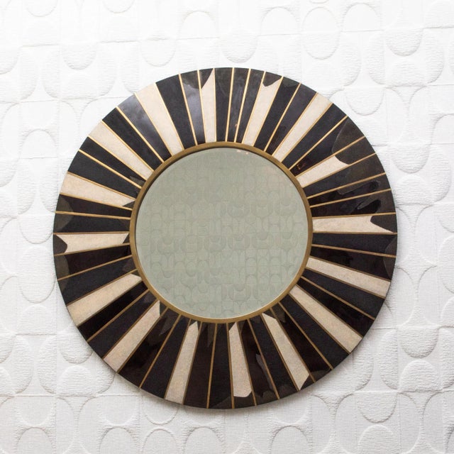 The Sunburst Mirror by R&Y Augousti is an exquisite embodiment of art deco elegance and artisanal craftsmanship. This...