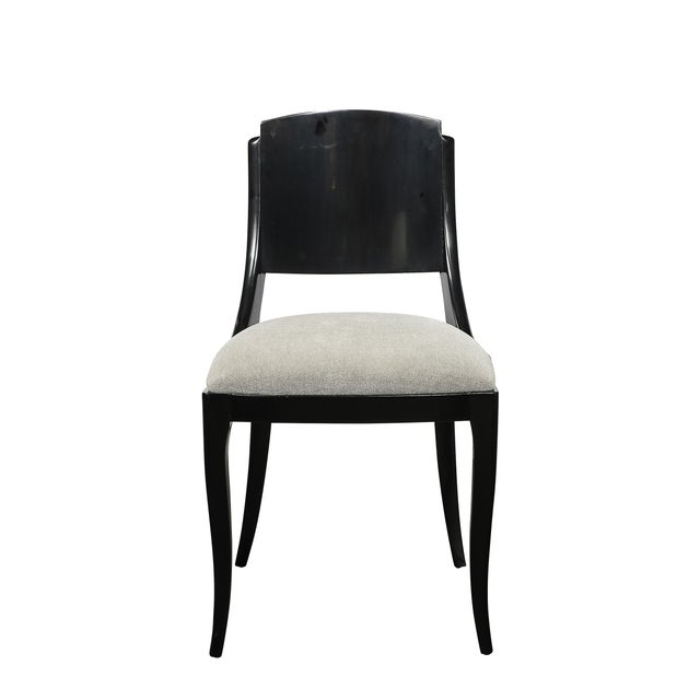 This sophisticated set of six Art Deco dining chairs, crafted in France circa 1930, showcases the impeccable craftsmanship...