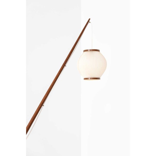 The very rare fishing pole floor lamp, designed by svend aage holm sørensen and produced by holm sørensen & co in denmark,...