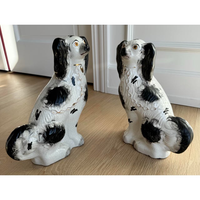A charming matched pair of authentic antique Staffordshire "Wally Dug" King Charles Spaniels, dating to the late Victorian...