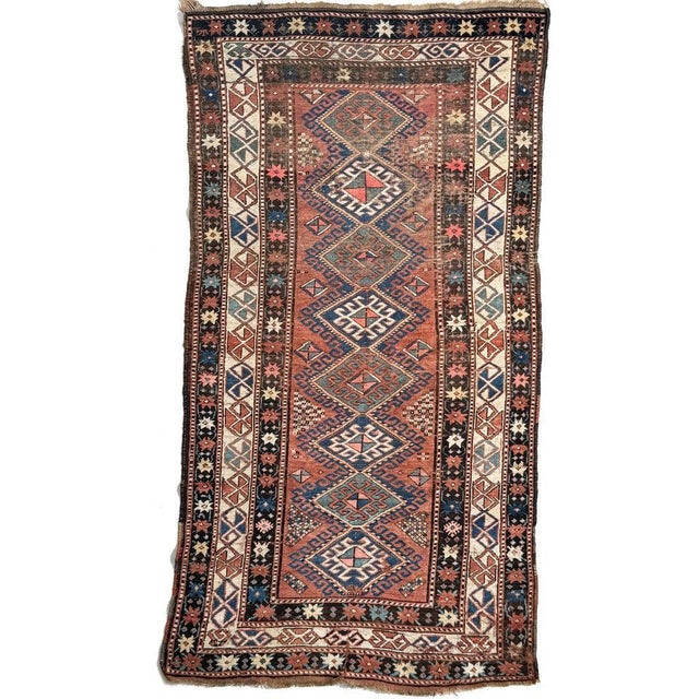 Name: HANDSOME Kazak with Nice Tribal Design in Clay, Terracotta, Amazing Blues and Greens Size: ~ 4 x 7.9 Age: Antique,...