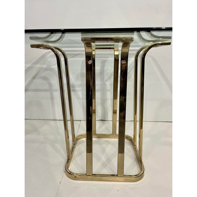 Elevate your space with this exceptional example of 1970s Mid-Century Modernist design. This stunning table features a...