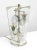 Very early Fontana Arte table lamp. Floral arrangement in brass tube and zinc lamp sockets, flanked by two glass-plates...