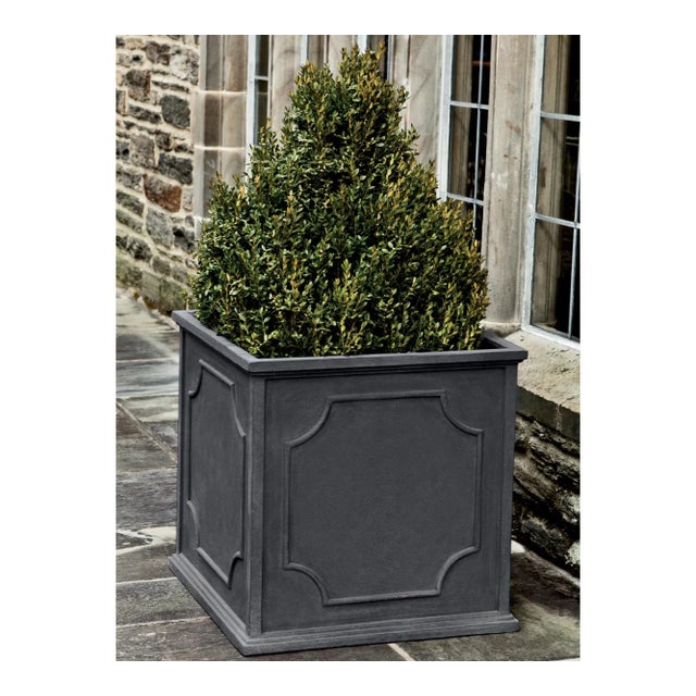 A square planter of Fiber Clay Composite in a lead lite finish. Available in multiple sizes or as a set of four.
