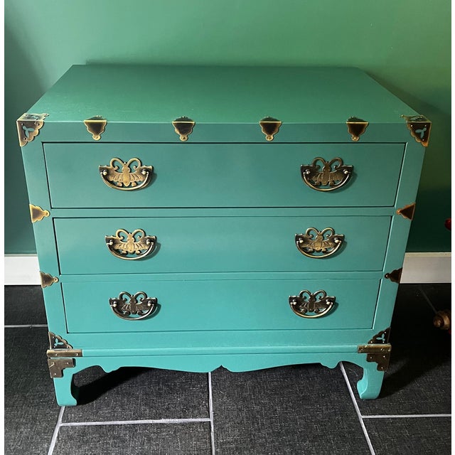 Rare Chinoiserie style chest by Henredon that has been lacquered in a beautiful medium sheen green. Butterfly hardware and...