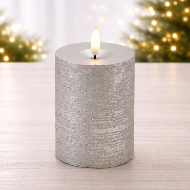 Create a warm and inviting glow in your home with this Metallic FIA Wick LED Candle set. Designed with a realistic wax...