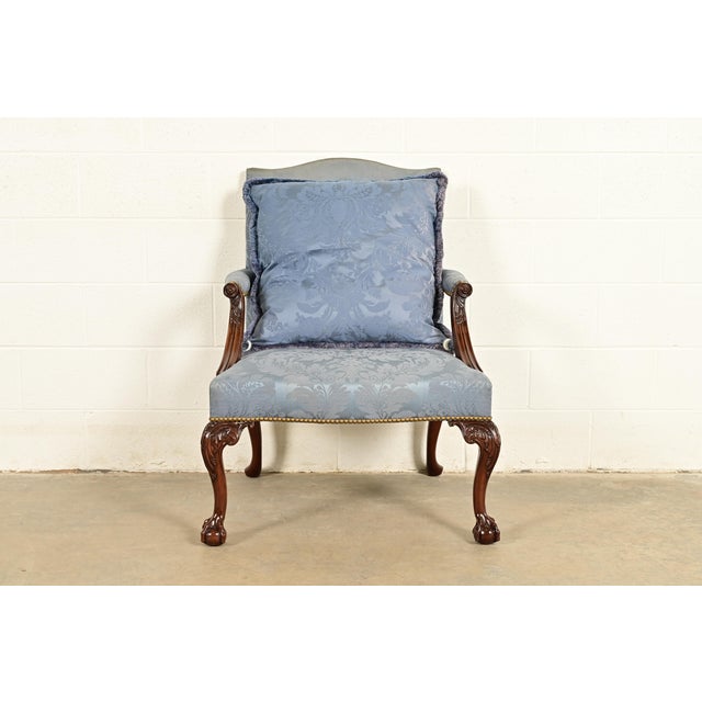 A gorgeous Chippendale or Georgian carved mahogany open arm library chair or lounge chair By Kittinger USA, 1991 Solid...