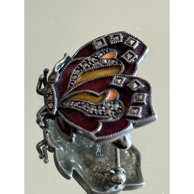 Mid-century sterling silver butterfly brooch by JMS Jewelry Manufacturing Co. featuring colorful enamel detailing and...