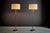 Elegant pair of floor lamps by Cosack, with slim brass stems and round bases. Each lamp has two light sockets and gives a...