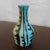 Small, Mid-Century Modern, art pottery vase by Hungarian artist Livia Gorka features a hand-painted, tribal motif in black...