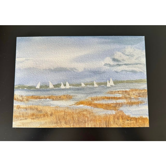 Traveling together by sea this flotilla makes a lovely sight beyond the weeds and under cloudy skies. Signed and ready to...