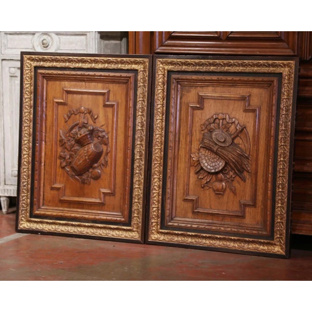 Decorate a man's office with this pair of elegant antique panels. Crafted in France, circa 1870, and made of oak, the...
