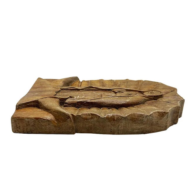 A hand-carved Virgin of Guadalupe Wood Plaque. This beautifully crafted wooden hanging plaque features the iconic image of...