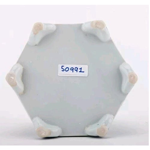Striking and elegant, this Chinoiserie-style porcelain tulipiere features a dramatic three-tier design inspired by...
