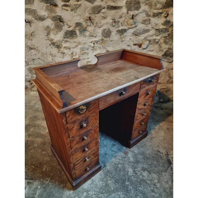 This antique french shop counter dates back to the 1900-1920 period and originates from a traditional french butcher's...