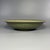 This vintage‑style Chinese Longquan celadon plate adopts rich olive‑green glaze. It is decorated with carved floral motif...