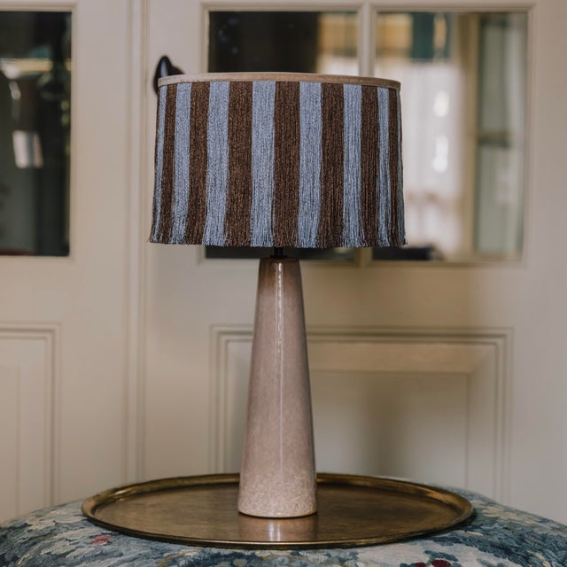 Jackie’s wide stripes hint at the carefree summers of the 70s, when beaches were filled with colourful umbrellas and...