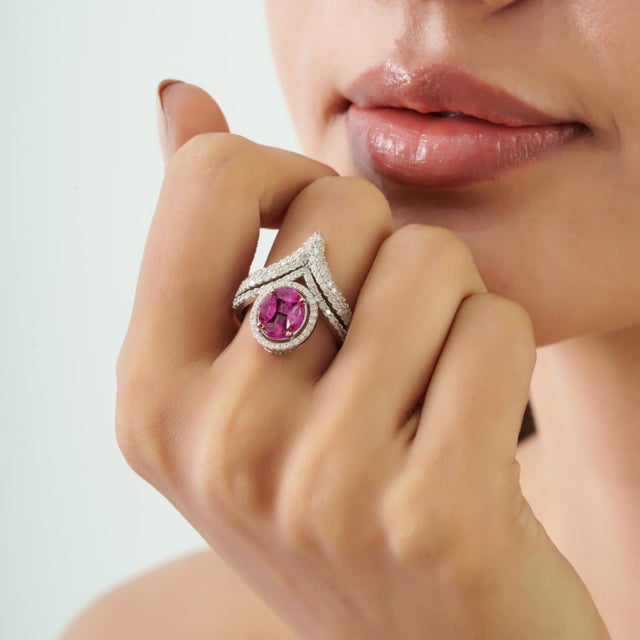This Valentine Chevron Ruby Tiara Ring is crafted in 925 sterling silver and features a graceful chevron design accented...
