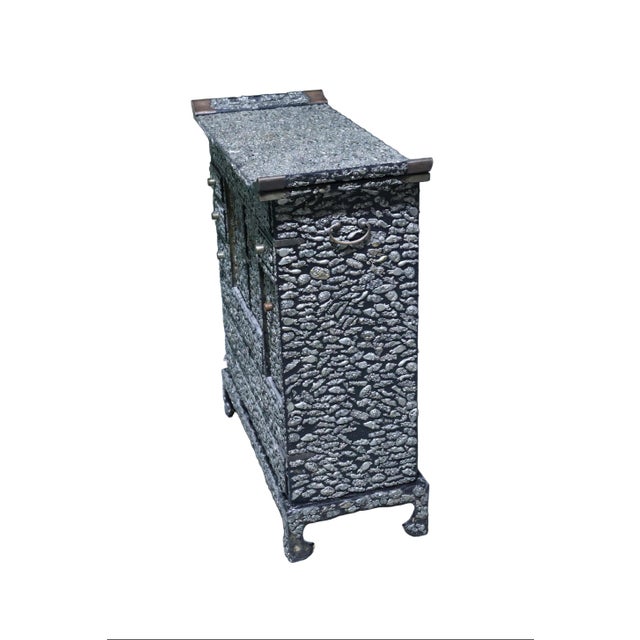 Incredibly crafted antique Japanese raised tansu with black background. Front, sides and back surface adorned in hand...