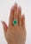 AGL Certified 6.79 Carat Oval Cut Minor Oil Colombian Emerald and Diamond Halo Cluster 18K Gold Ring. The emerald bears a...