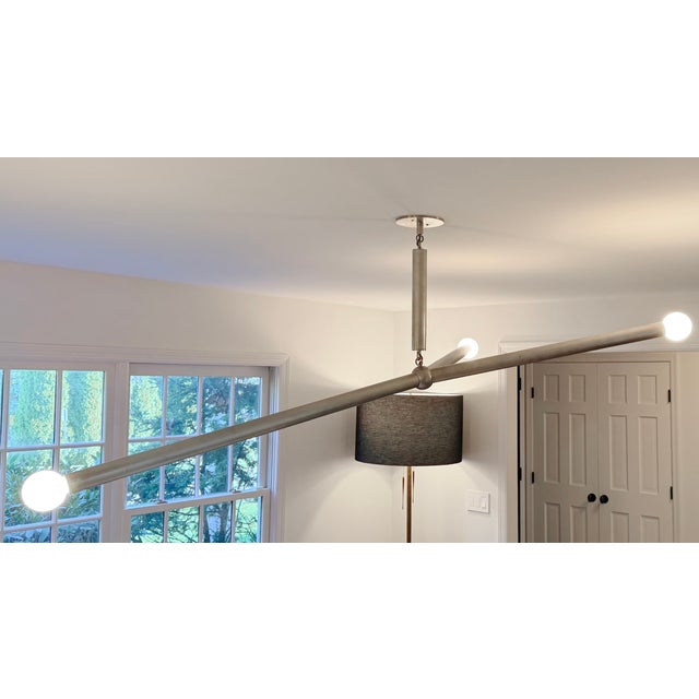 Arrow chandelier by Apparatus Studio in their premium Tarnished Silver finish and the larger of the two sizes they offer....